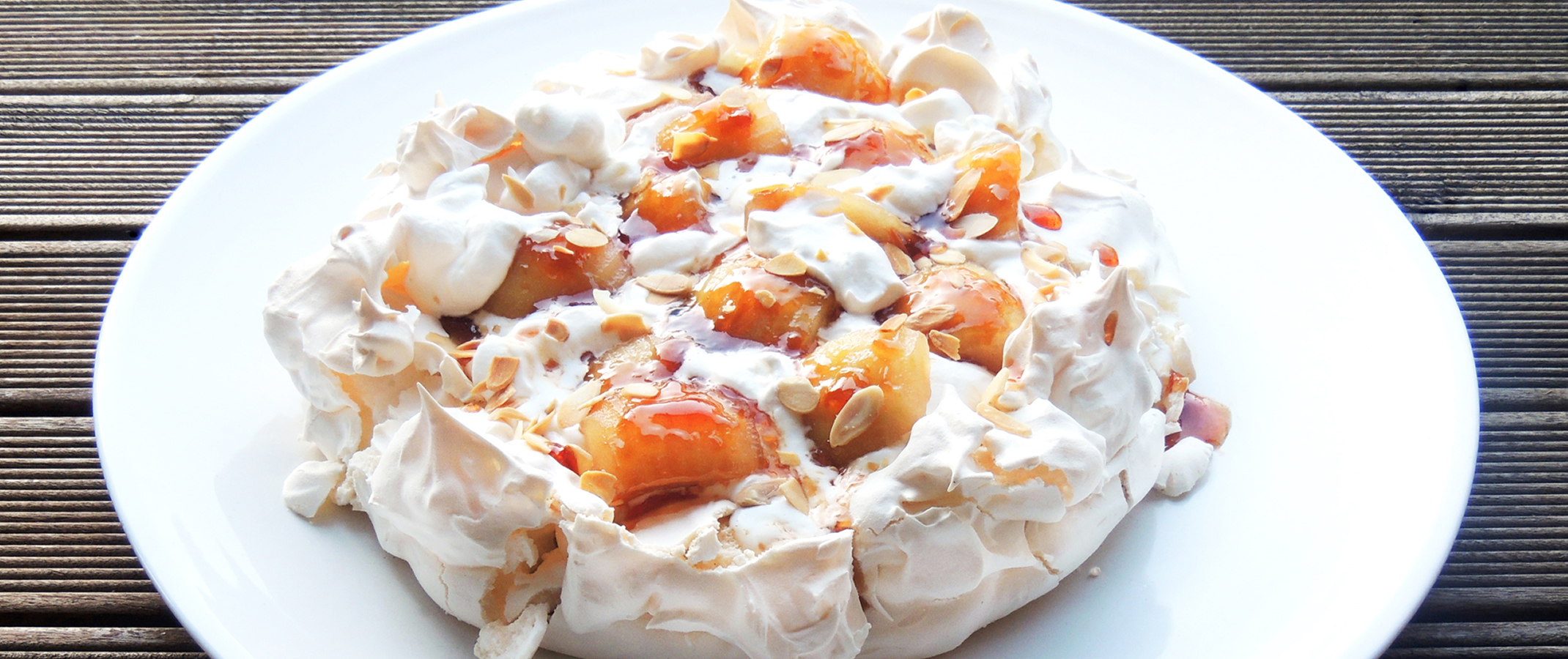 Pavlova with Poached Apples and Caramelised Verjuice Syrup
